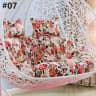 Coussin salon de jardin - chaise suspendue fleurie